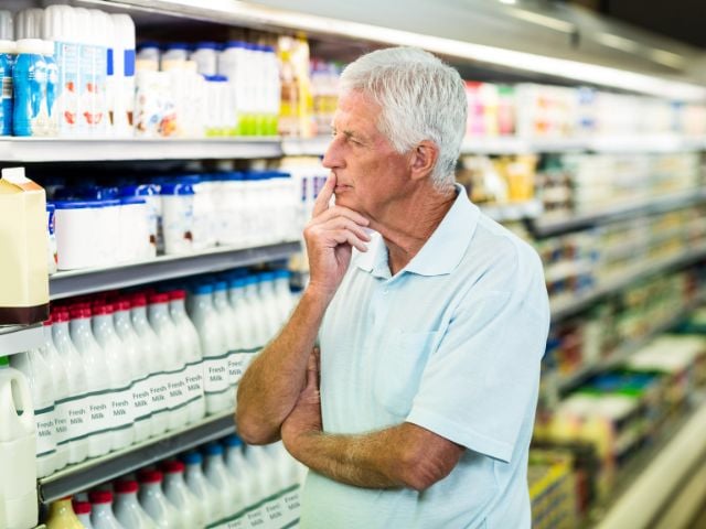 elder in deep thought of what to buy