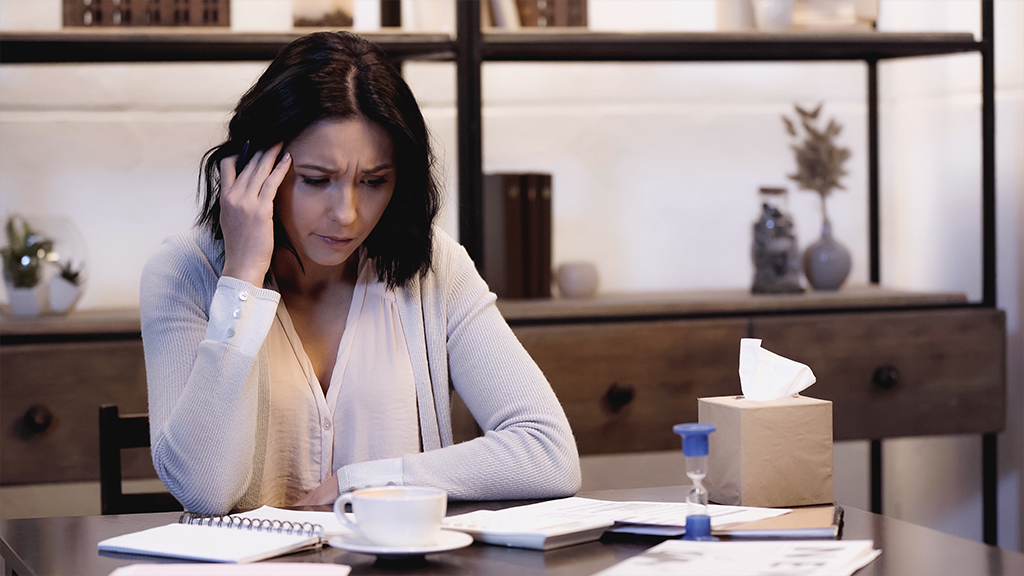 Woman thinking at work