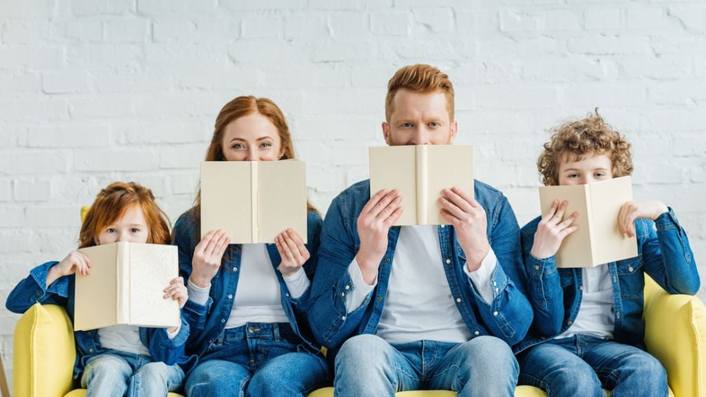 Family sitting down on a couch